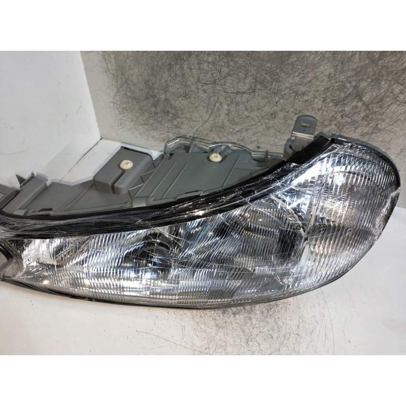 Recambio de faro izquierdo para ford mondeo berlina (gd) referencia OEM IAM  PATILLA ROTA 1997