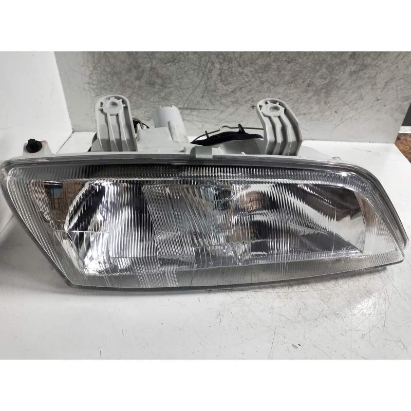 Recambio de faro derecho para nissan primera berlina (p11) referencia OEM IAM   