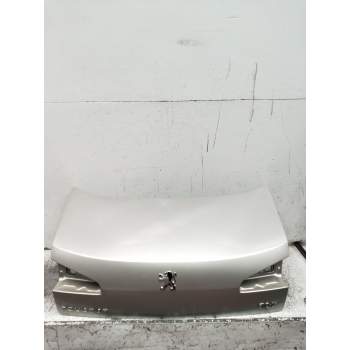 TAPA MALETERO 4P 2004