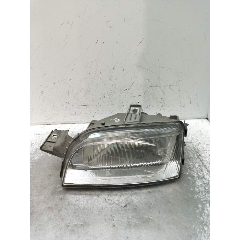 Recambio de faro izquierdo para fiat punto (176_) 1.7 td referencia OEM IAM   1994