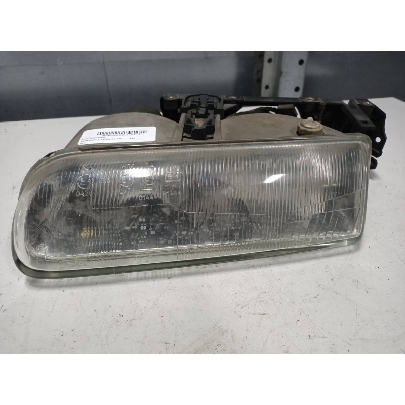 Recambio de faro izquierdo para chrysler le baron 3.0 cat referencia OEM IAM   