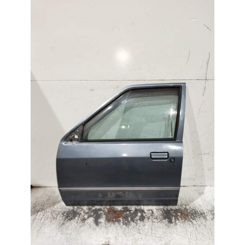 Recambio de puerta delantera izquierda para ford escort berlina referencia OEM IAM   4P