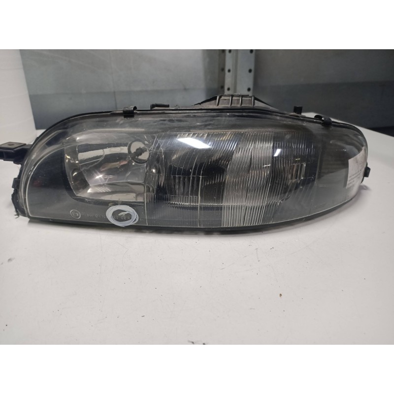 Recambio de faro izquierdo para fiat marea weekend (185) 1.9 jtd 110 st. moritz (i) referencia OEM IAM 88201557  