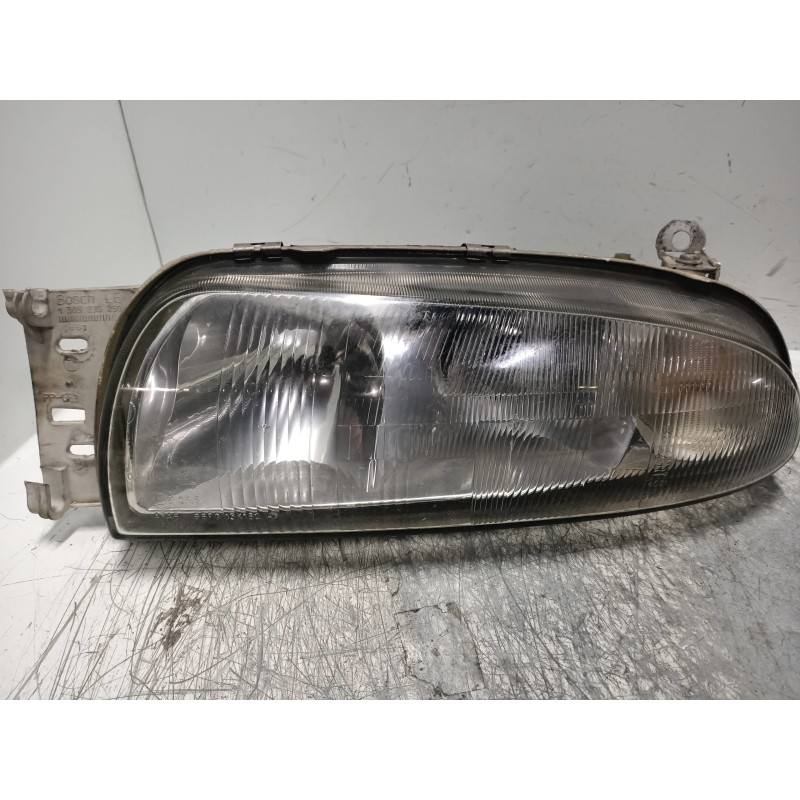 Recambio de faro izquierdo para ford fiesta berlina básico referencia OEM IAM 0301049003  