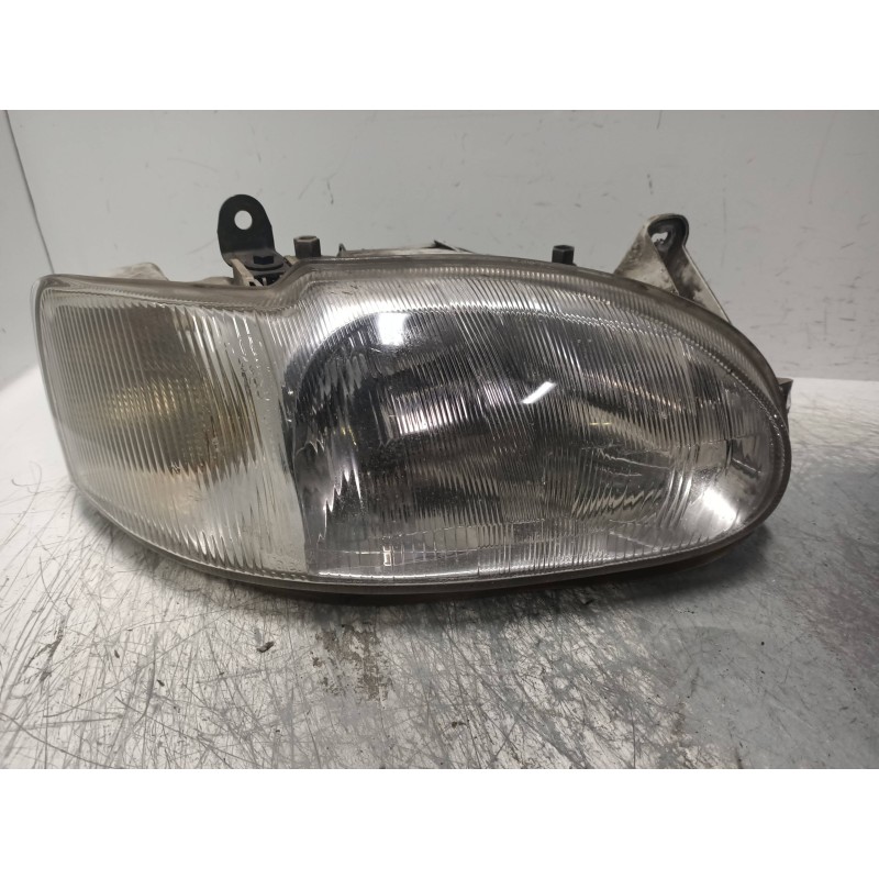 Recambio de faro derecho para ford escort berl./turnier atlanta berlina referencia OEM IAM   