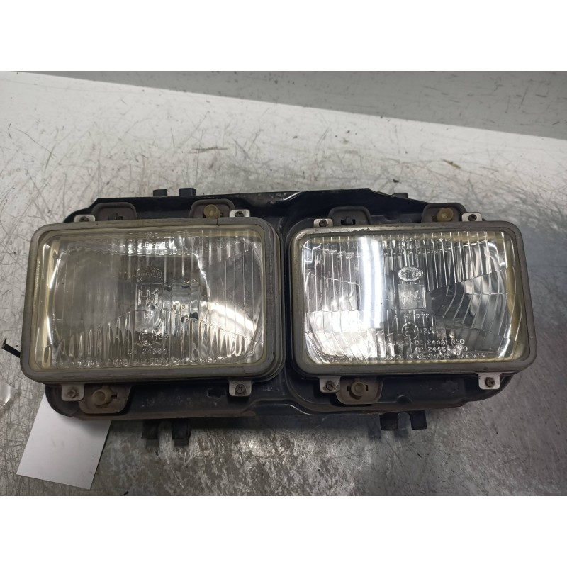 Recambio de faro izquierdo para nissan m-125 td referencia OEM IAM   