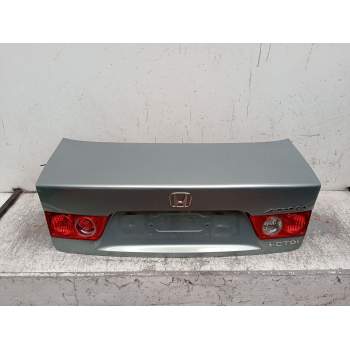 TAPA MALETERO 4P 2004