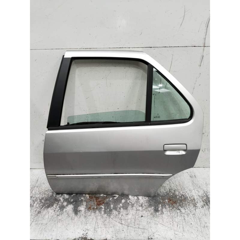 Recambio de puerta trasera izquierda para peugeot 306 break boulebard referencia OEM IAM  5P 2000