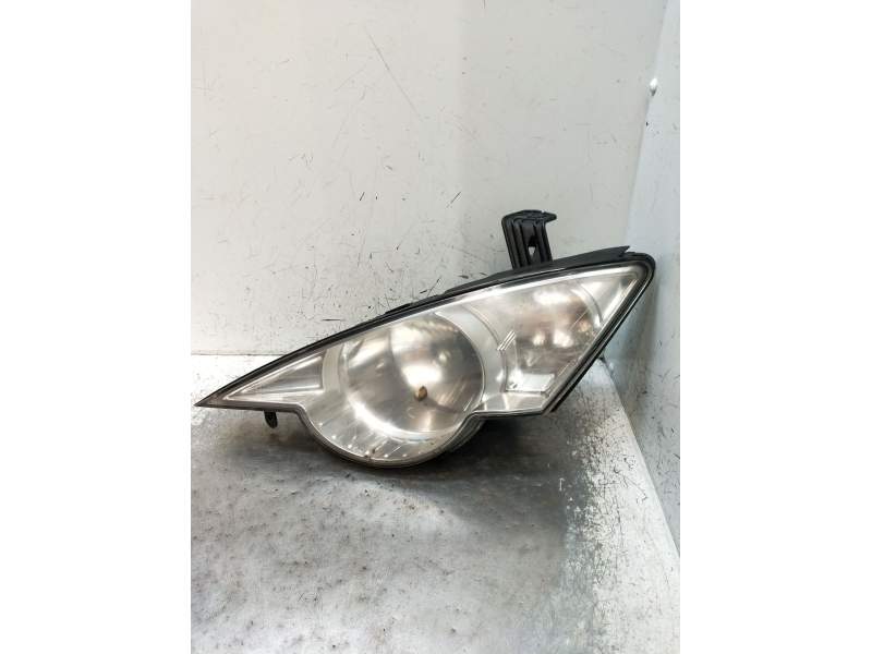 Recambio de faro izquierdo para ssangyong actyon i 2.0 xdi referencia OEM IAM   2006