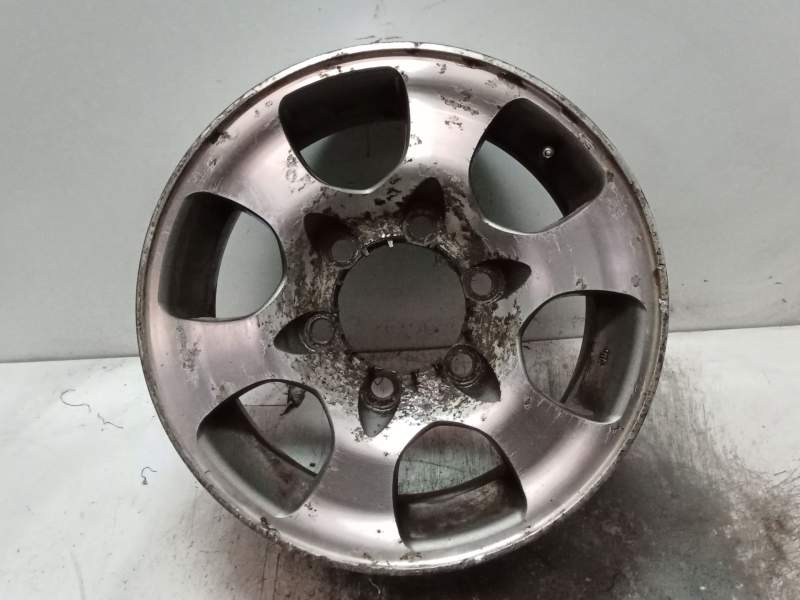 Recambio de llanta para mitsubishi montero (v20/v40) 2.5 turbodiesel referencia OEM IAM J15X6JJ ET33 CON CENTRO RAYADA