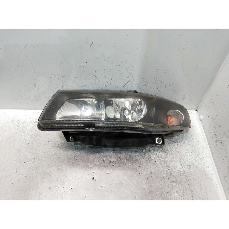 Recambio de faro izquierdo para seat leon (1m1) referencia OEM IAM 67742691  FALTA TAPA TRASERA