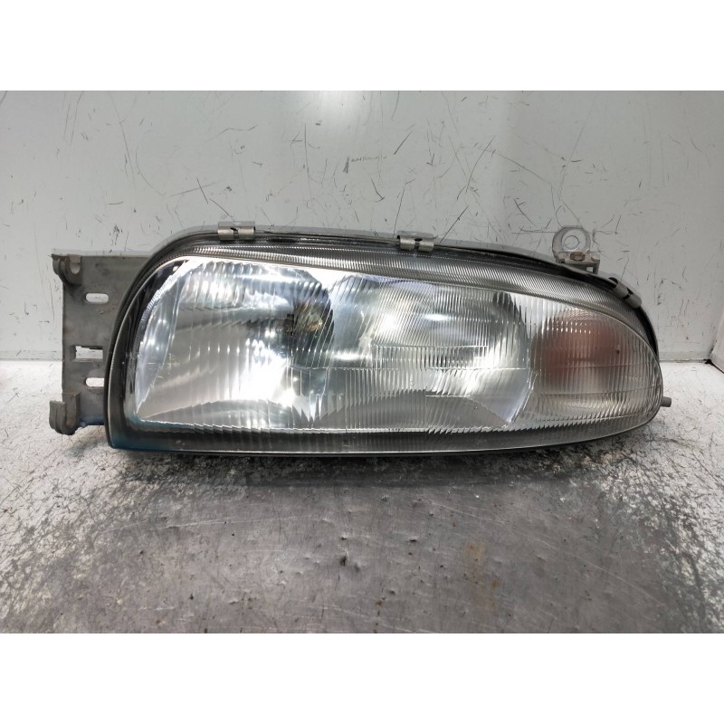 Recambio de faro izquierdo para ford fiesta berlina referencia OEM IAM 084311128  